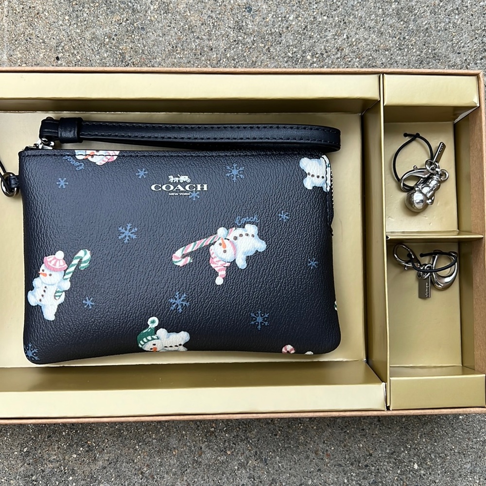 Coach winter wristlet with charms